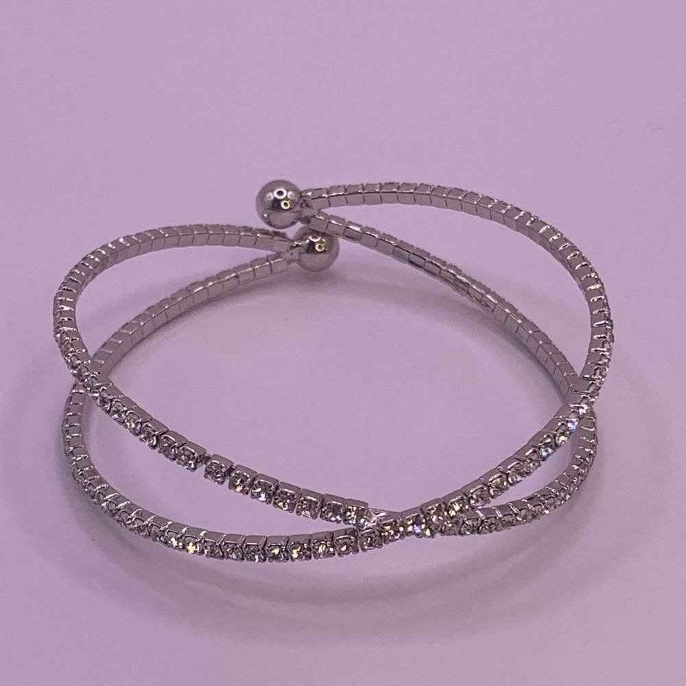 This cuff style CZ slip on bracelet offers a modern look with tons of bling.